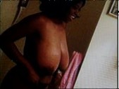 Pretty black girl has huge hanging boobies